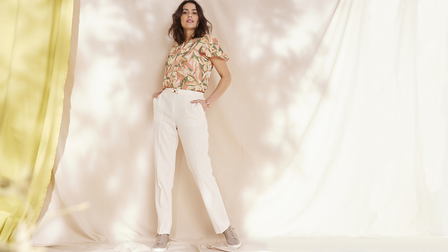 Leaf print blouse and tailored white trousers